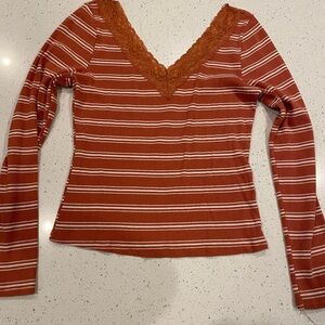 Orange and white striped long sleeve